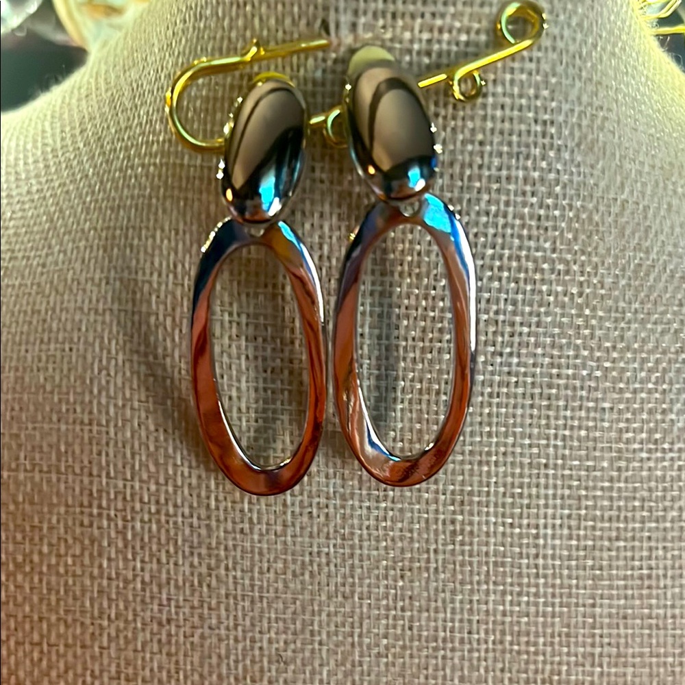 Elegant Silvertone Clip Oval Drop Earrings